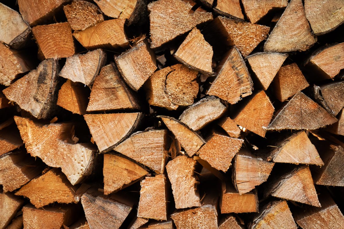 A stack of kiln dried wood as recommended for burning on wood burning stoves by WB Stoves